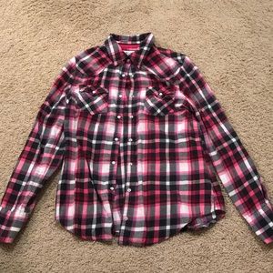 A pink and gray plaid flannel